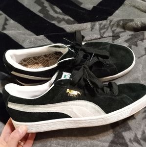 Black suede Puma sneakers